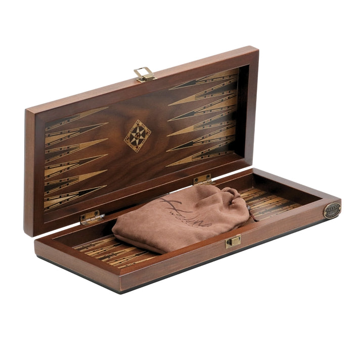 Diagonal view of 3-in-1 chess, checkers & backgammon set from Helena Wood Art showing interior backgammon board with marquetry, and drawstring bag holding wooden discs and dice.