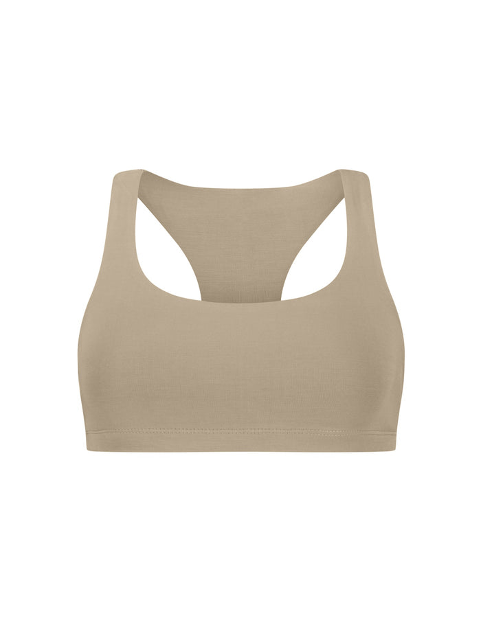 Beige sports bra on a white background