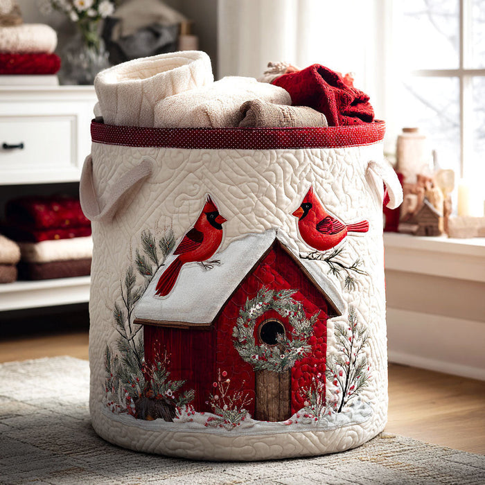 Quilted laundry basket with cardinals and a red birdhouse in snow