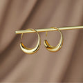 Carina | Gold-Tone Mini Hoops with Defined Line
