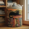 Quilted laundry basket with a black cat lying on a shelf of books