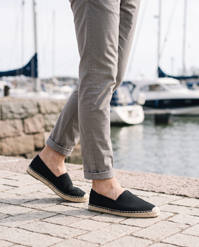 Black espadrilles on the Helsinki harbour quayside