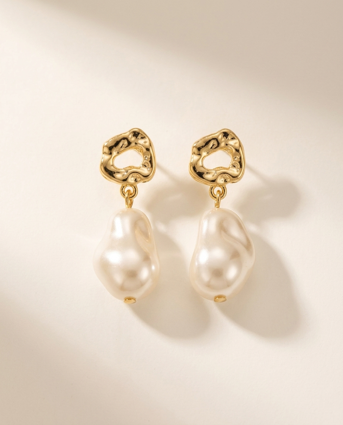 Hammered gold earrings with baroque pearl drop