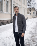 Quilted knit-sleeve jacket worn on a Kruununhaka street in Helsinki
