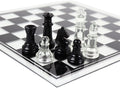 Side angle of glass chess set with a close up image of seven chess pieces