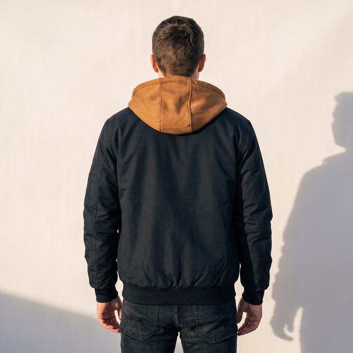 Back view of the quilted hooded bomber jacket with the camel fleece hood down