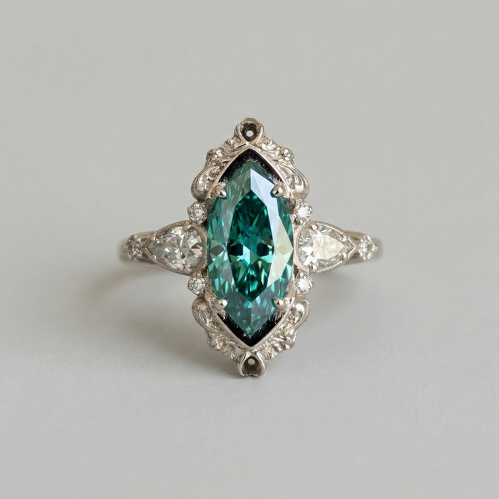Helena | Ring with Decorative Emerald Settings