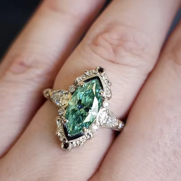 Helena | Ring with Decorative Emerald Settings
