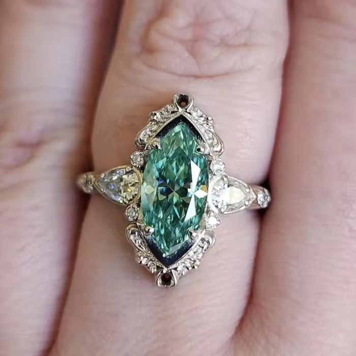 Helena | Ring with Decorative Emerald Settings