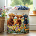 Quilted laundry basket with three Highland cows in a wildflower meadow