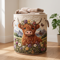 Highland cow meadow quilted laundry basket standing on a wooden floor at home