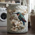 Quilted laundry basket with a hummingbird on a white magnolia branch