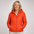 EMMA Ilona lightweight padded jacket in orange, worn by a model