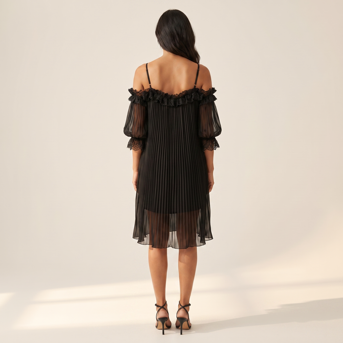 Back view of the Ilta chiffon dress, showing the open back and thin shoulder straps