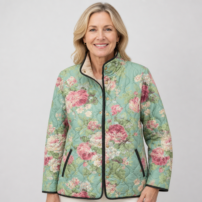 EMMA Leila quilted jacket in mint green large floral print, worn by a model