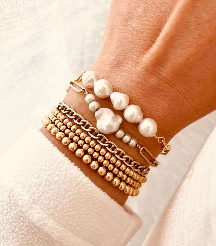 Leonie | Gold-Tone Playful Bracelet with Pearls Details