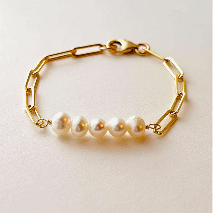 Leonie | Gold-Tone Playful Bracelet with Pearls Details