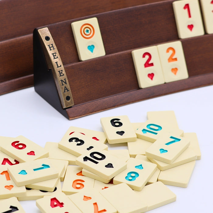 Close-up of luxury Rummikub set showing curved solid beech wood racks and heat-treated melamine tiles by Helena Wood Art