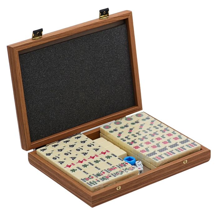 Premium mahjong tile set in walnut replica case displayed open with organised tiles