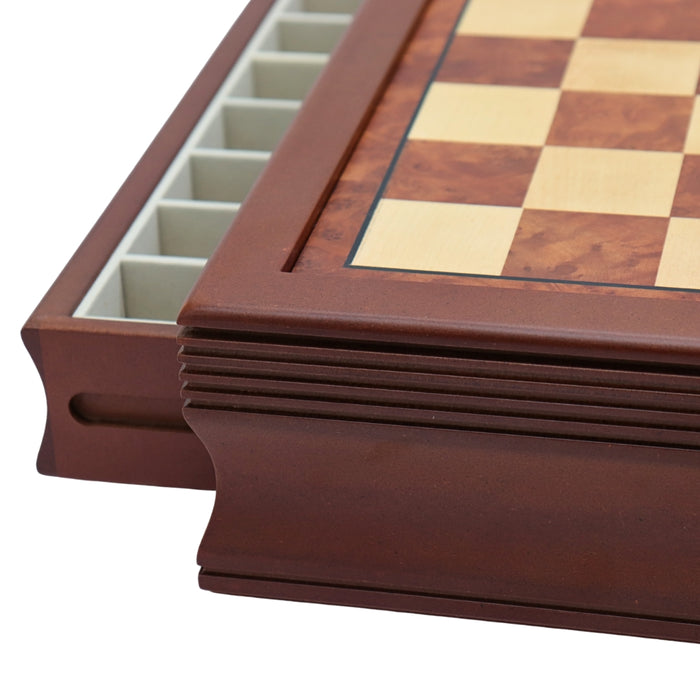 Side view close-up of maple mahogany chess board with drawers 45mm squares with one drawer open showing compartments for piece storage