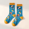 Long jacquard sports socks laid flat on an off-white backdrop