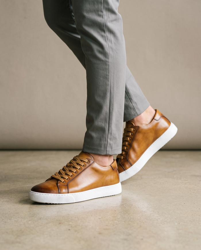 Saint-Tropez tan leather sneakers worn on model