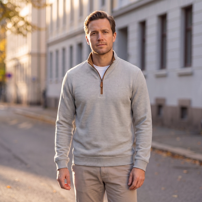 Light grey waffle half-zip sweatshirt worn on a Helsinki street in autumn