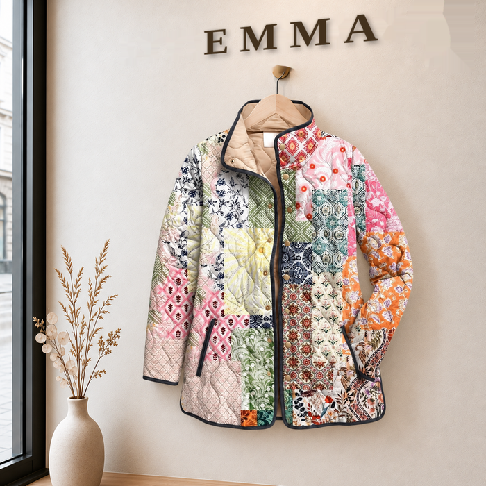 EMMA Sylvi quilted jacket in pastel patchwork print, on a hanger in the EMMA boutique