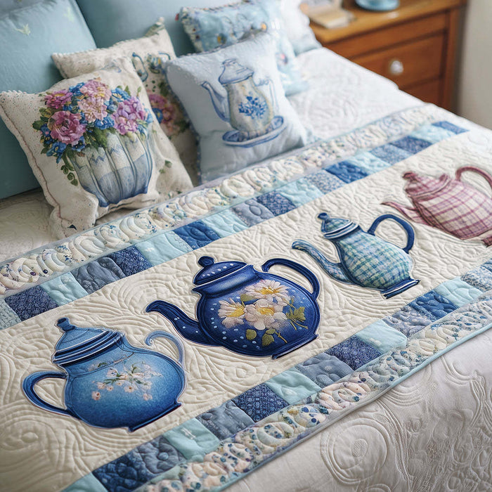 Quilted bed runner with blue and white teapots and roses