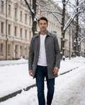 Grey car coat worn on Bulevardi in Helsinki