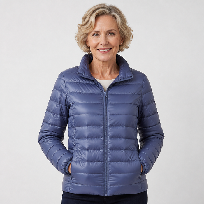 EMMA Ulla lightweight padded jacket in indigo, worn by a model
