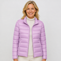 EMMA Ulla lightweight padded jacket in lilac, worn by a model