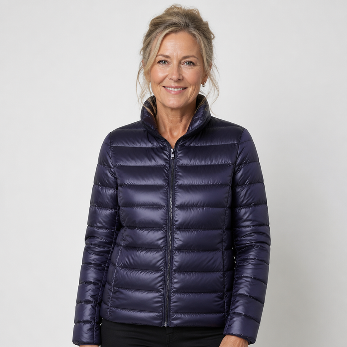 EMMA Ulla lightweight padded jacket in navy, worn by a model