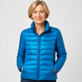 EMMA Ulla lightweight padded jacket in sky blue, worn by a model