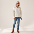 Woman wearing the Usva off-white waffle-knit half-zip sweatshirt, front view
