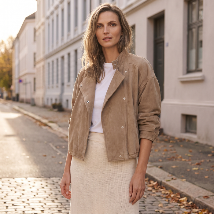 Khaki taupe suede-touch blouson jacket worn open on a Helsinki street in autumn