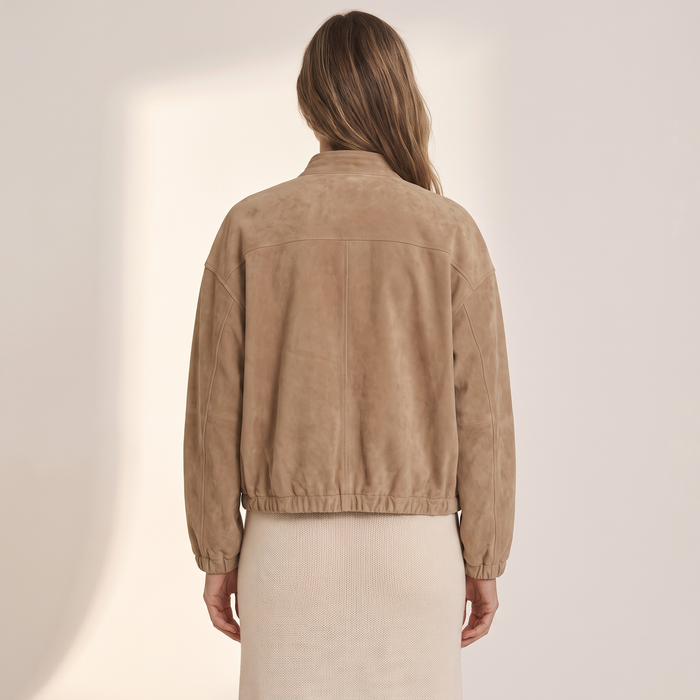 Back view of the khaki taupe blouson jacket showing the dropped shoulders and gathered hem