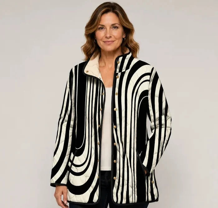 EMMA Vanamo quilted jacket in monochrome wave print, worn by a model