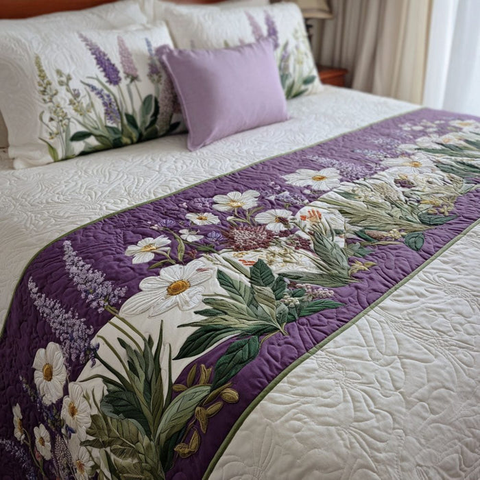 Quilted bed runner with white lilies, ferns and an aubergine border