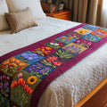 Quilted bed runner with a wildflower panel and magenta border